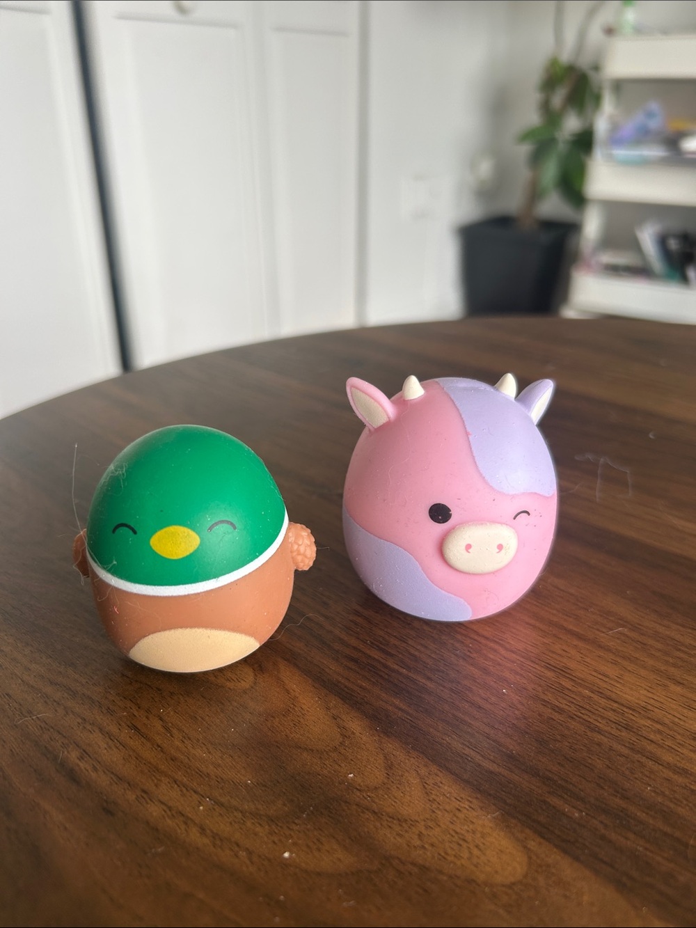 Squishmallow pink cow and duck squishy toys
